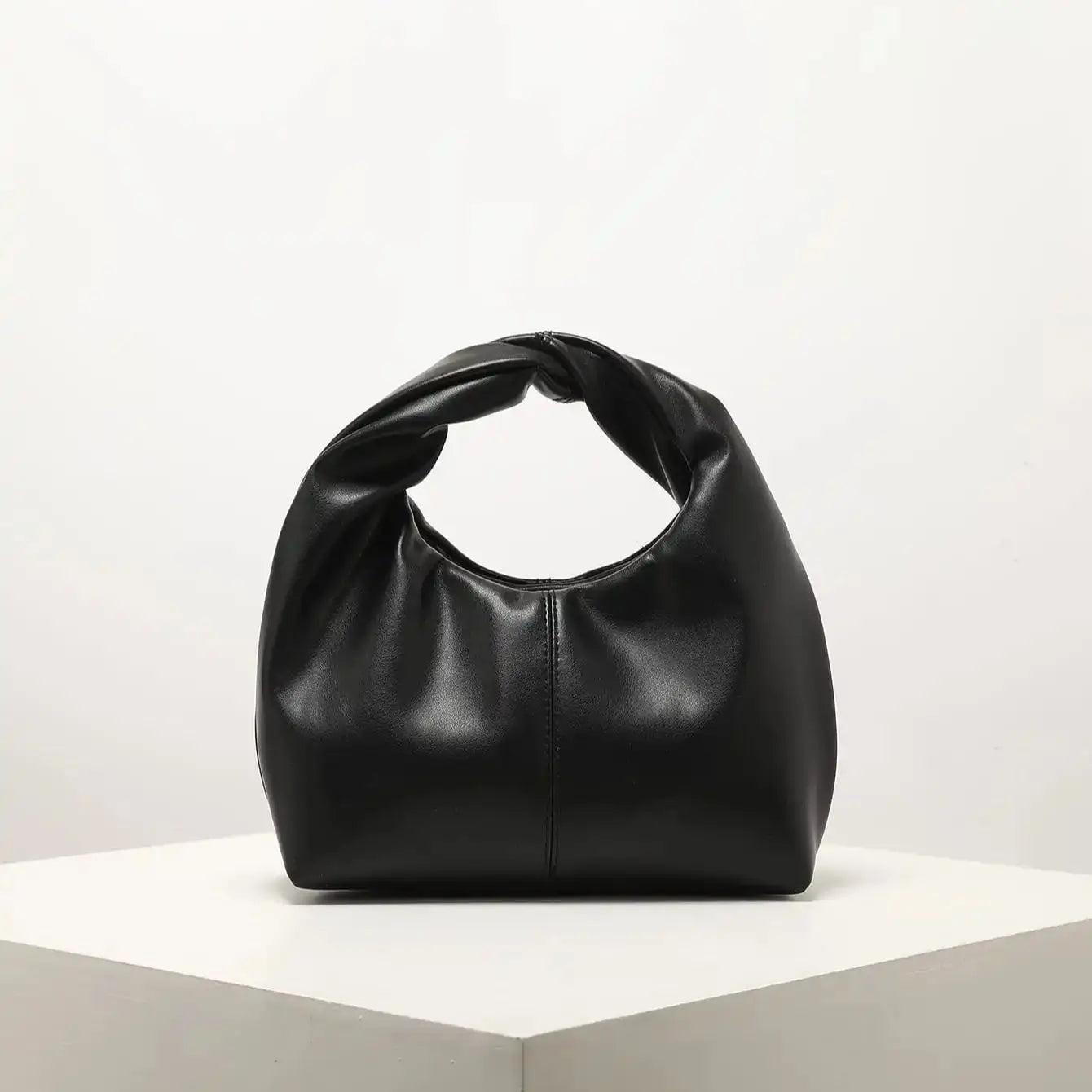 Sac pochette en cuir Gelyn